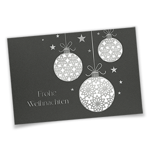 Vergrößere Abbildung Dunkelgraue Weihnachtskarte mit silbergeprägtem Frohe Weihnachten, Sternen und lasergestanzten Weihnachtskugeln